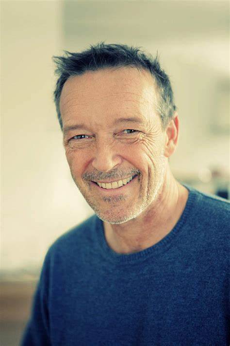 Frühes Leben und Karrierebeginn, Michael Roll